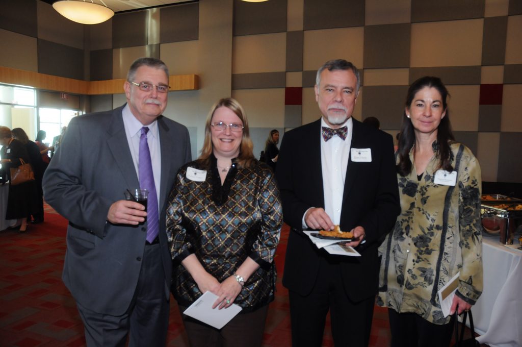 Ron Smith, Vice President for Research and Dean of the Graduate College; Kristene Fisher, executive director of the Academic Affairs Office; Michael Bowers, Executive Vice President and Provost; and Susan Thompson, Director of International Programs are Phi Kappa Phi members and mentors.